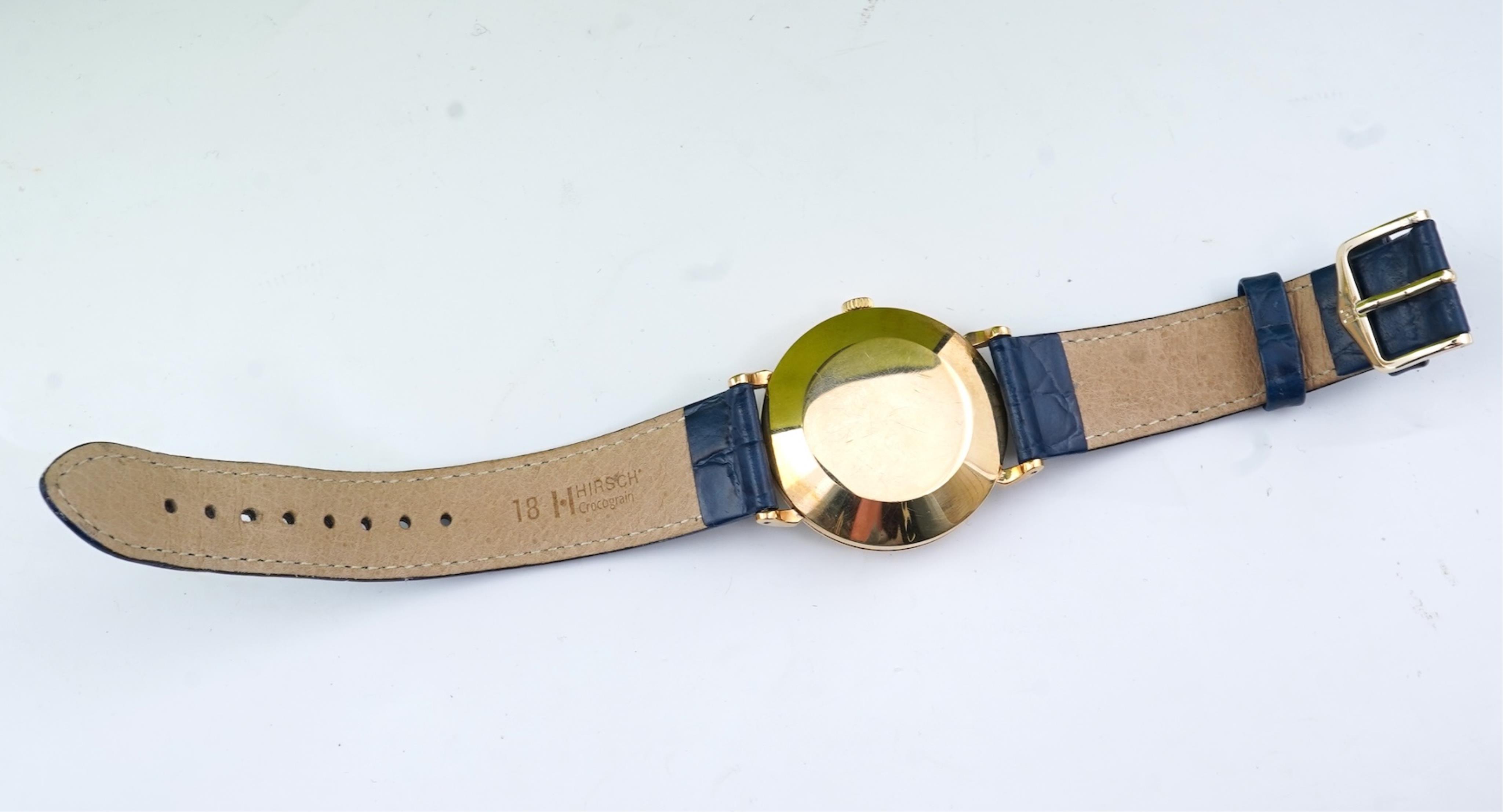 A gentleman's late 1950's 9ct gold Omega Automatic wrist watch